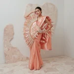 Holographic Armor Saree: Pastel Coral Silk with Rigid Shards | instagram trending prompt copy and paste